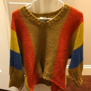 Super cute boutique sweater. Only worn once.